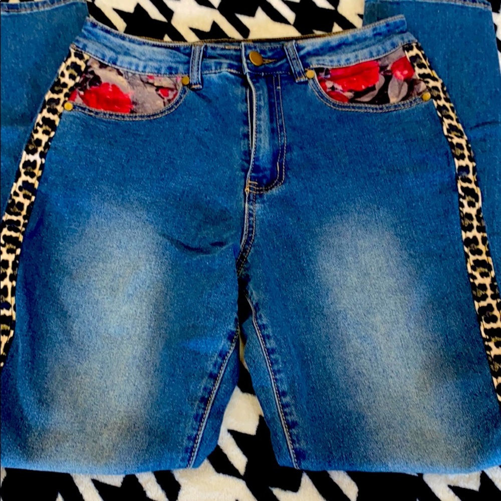 Massey jeans with leopard and floral accents.
